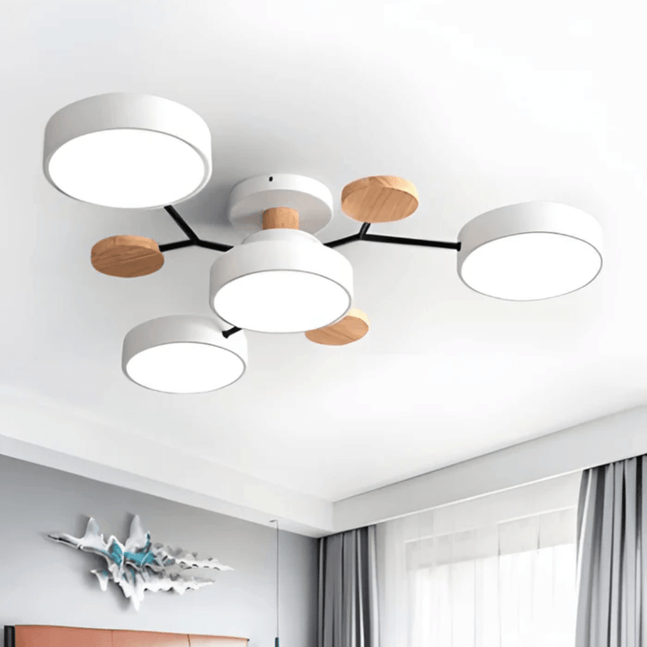 Éclairage LED plafond rond, esthétique minimaliste, parfait pour un salon moderne et lumineux.