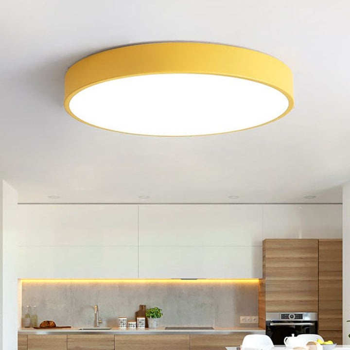 Plafonnier LED rond ultra fin, éclairage intérieur moderne, lumière douce pour salon ou chambre.