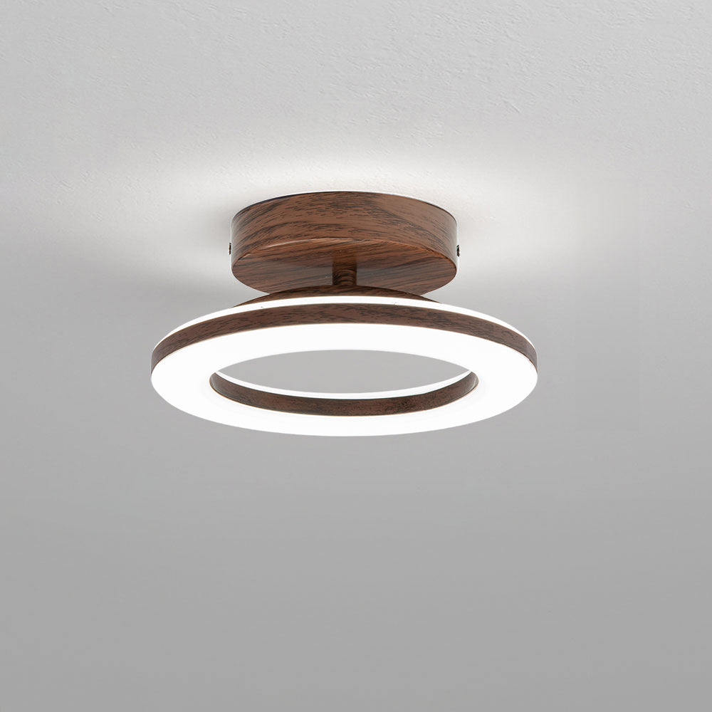 Plafonnier LED moderne disque offrant un éclairage ambiant élégant et homogène pour l'intérieur.