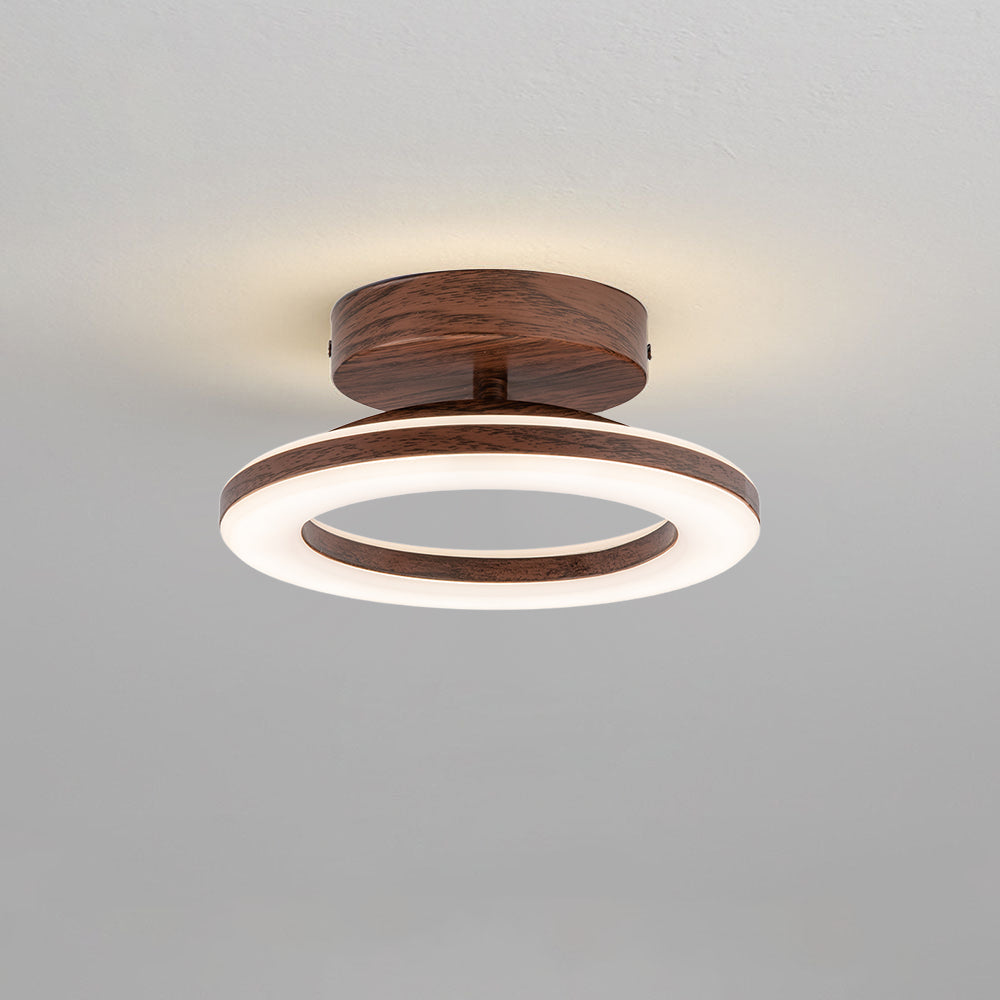 Luminaire LED design de plafond en forme de disque, idéal pour une décoration de maison moderne.