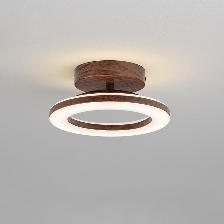 Luminaire LED design de plafond en forme de disque, idéal pour une décoration de maison moderne.