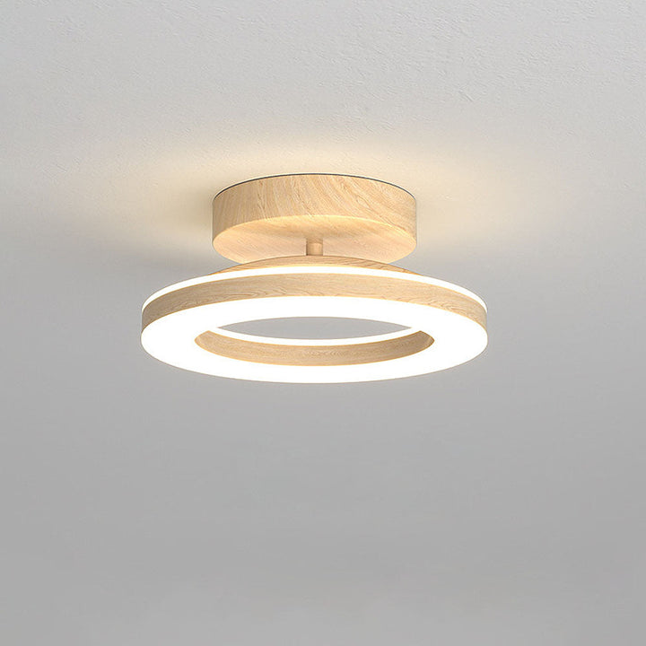 Élégant plafonnier LED disque blanc, style moderne pour un éclairage de qualité au plafond.