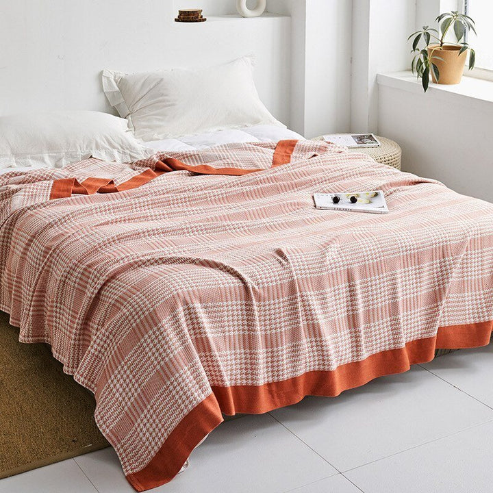 Confort et style: plaid moderne pour canapé, idéal pour la décoration intérieure de votre foyer.