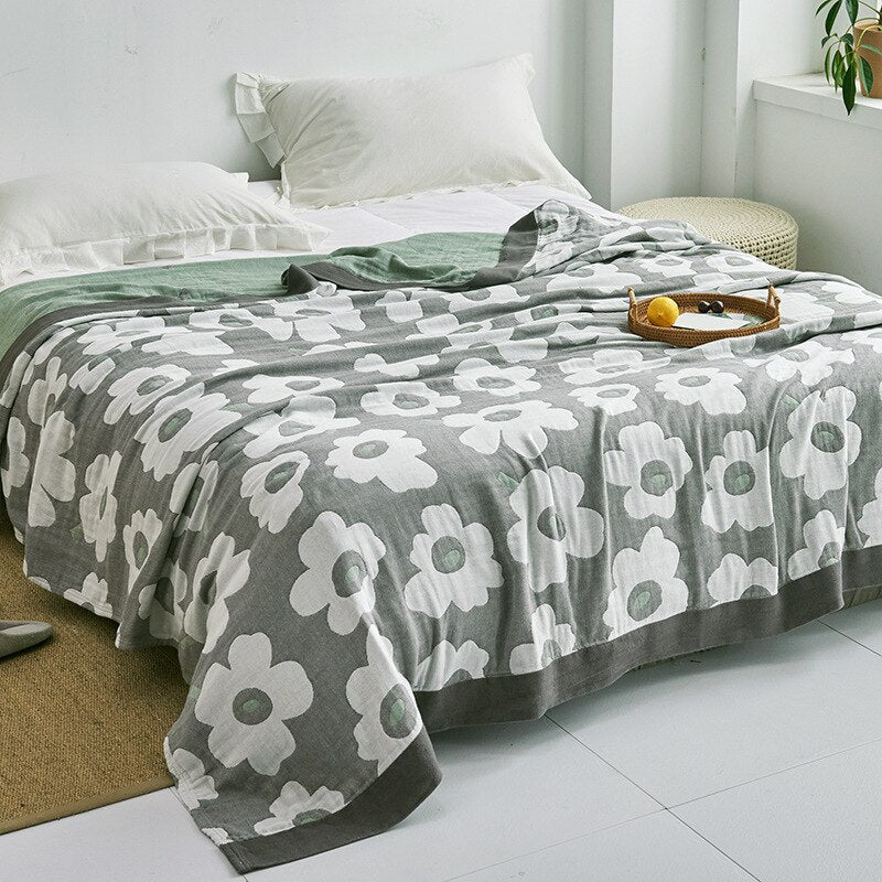 Textile maison: plaid doux et moderne, idéal pour canapé ou lit, confort garanti.