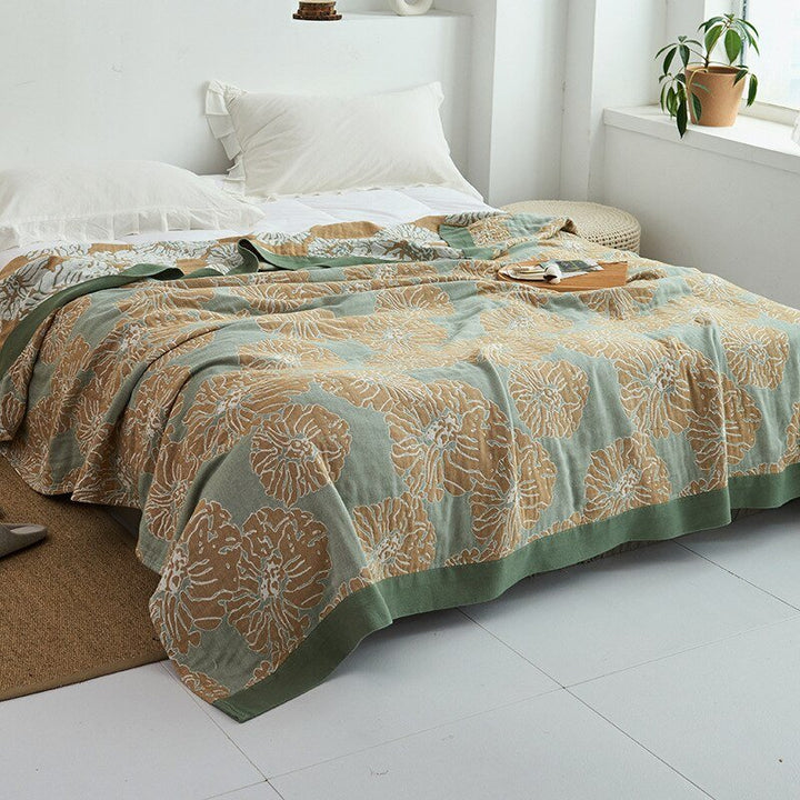 Plaid pour lit, doux, moderne et confortable, pour une chambre cosy et reposante.