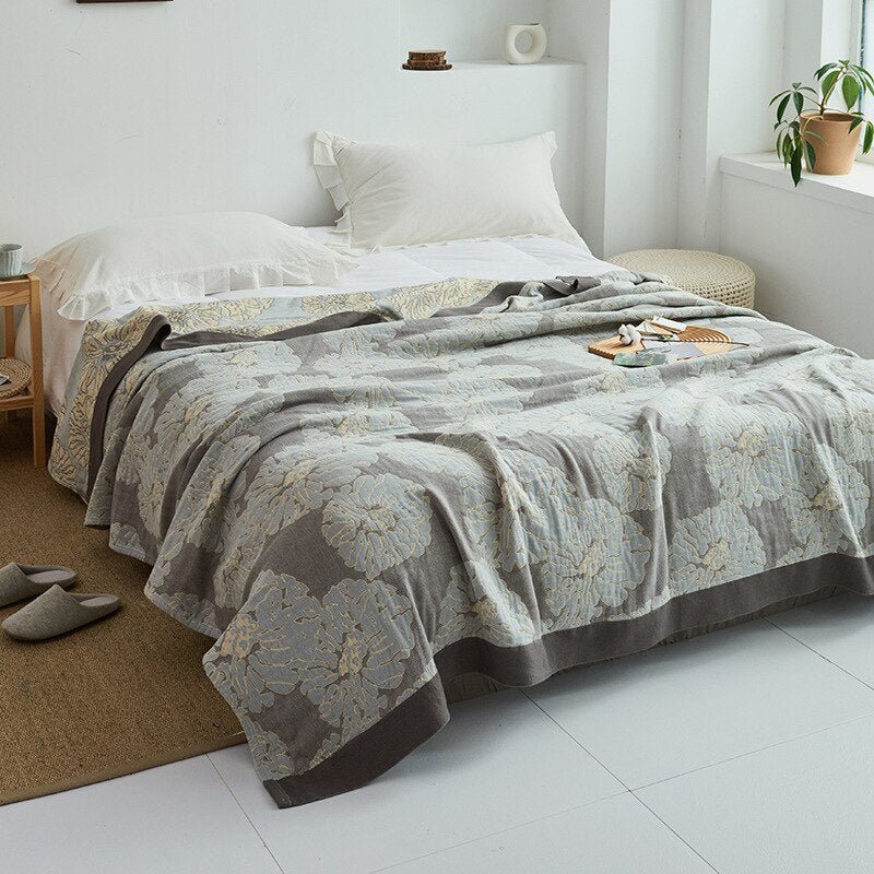 Plaid doux et stylé, motif moderne, pour canapé, lit, ajoutant confort au salon avec chic.
