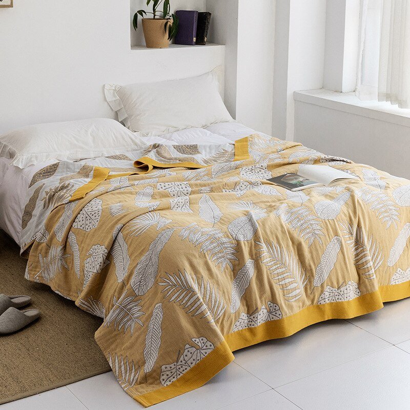 Accessoire maison moderne: plaid confortable pour canapé, style et douceur garantis.