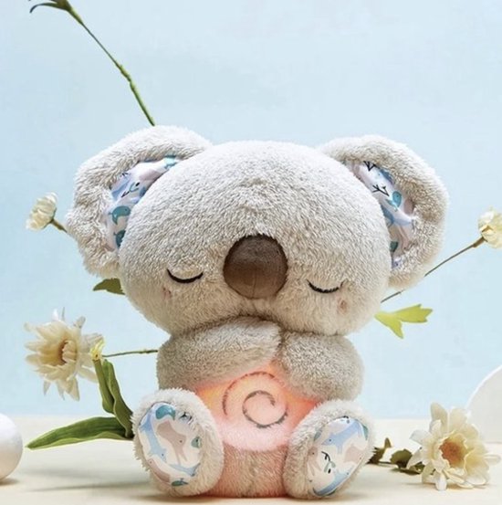 Peluche apaisante pour bébé avec respiration et veilleuse intégrée pour un sommeil doux.