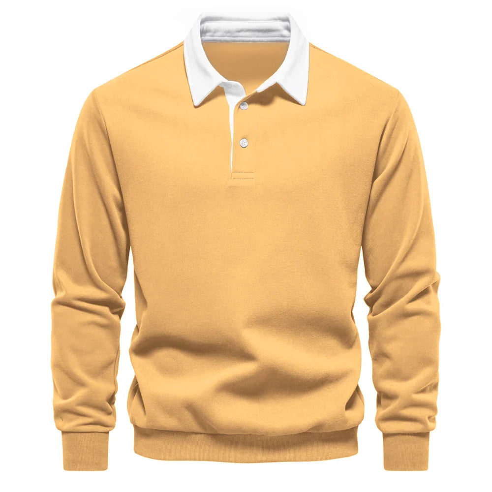 Polo rugby homme chic, manches longues, col contrastant, style sportif masculin. Idéal pour automne/hiver.
