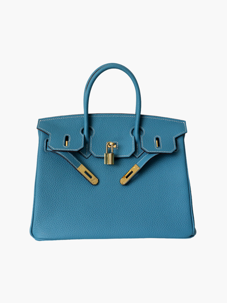 Sac bandoulière en cuir, finition soignée, l'accessoire élégant de la femme moderne.