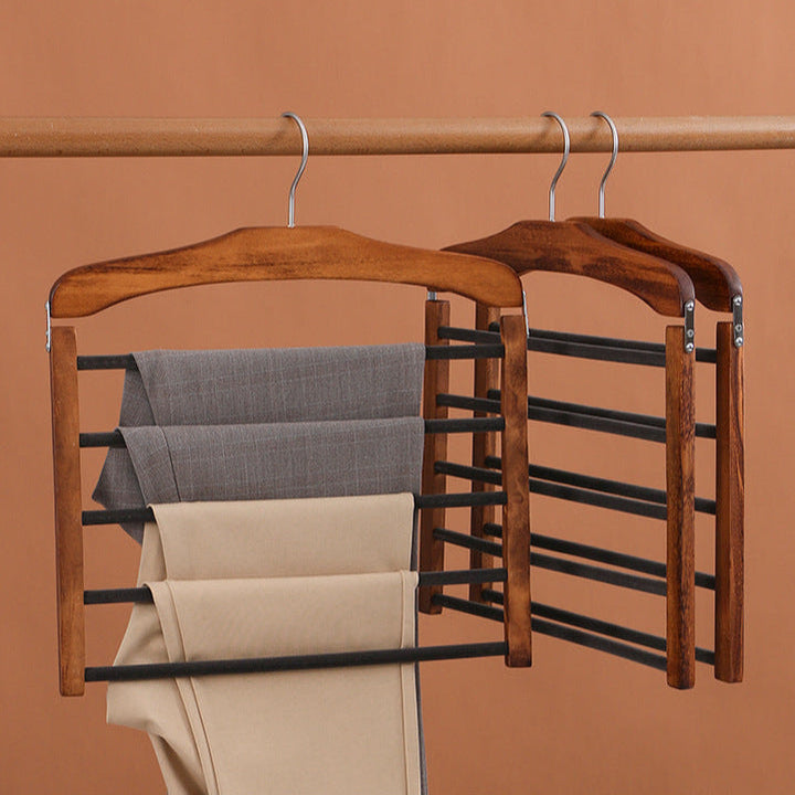 Gagnez de la place avec ce portant à pantalons multi-barres en noyer massif. Un accessoire dressing élégant et robuste.
