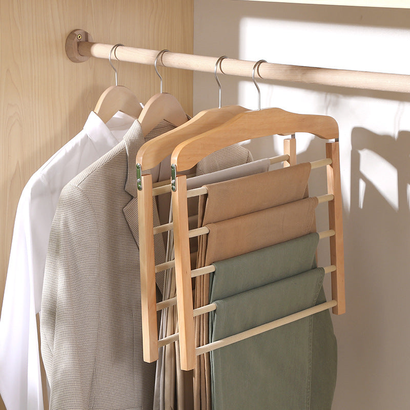 Rangement penderie intelligent : portant à pantalons multi-barres en noyer massif, accessoire dressing élégant et pratique.