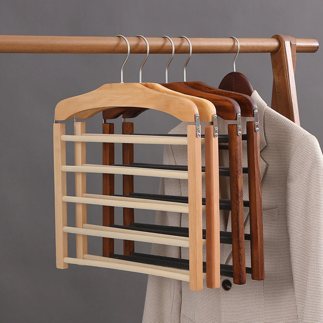 Portant à pantalons en noyer massif, idéal pour rangement penderie. Gain de place et antifroissement pour vos vêtements.