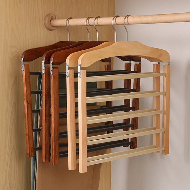 Organisateur vêtements design : portant à pantalons multi-barres en noyer massif, élégant pour toute décoration intérieure.