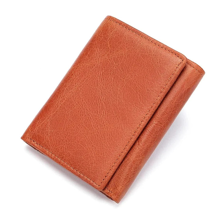 Portefeuille en cuir noir véritable avec blocage RFID. Offre sécurité et style pour l'homme moderne.