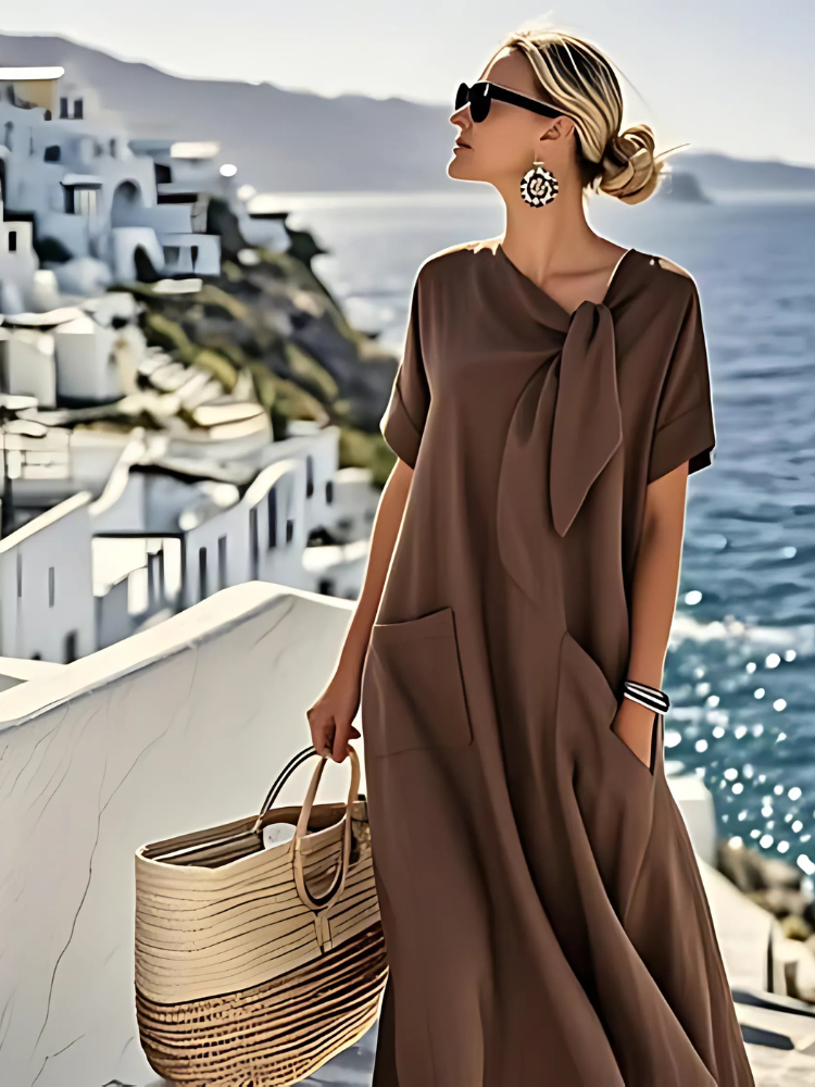 Tenue estivale: robe femme fluide, chic et confortable avec poches. Parfaite pour un look élégance casual et facile.