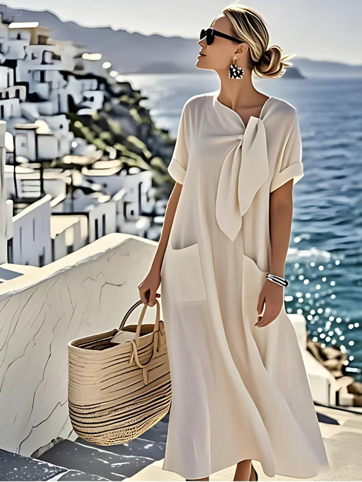 Robe d'été femme élégante et fluide, parfaite pour une tenue estivale chic et décontractée. Confort garanti.