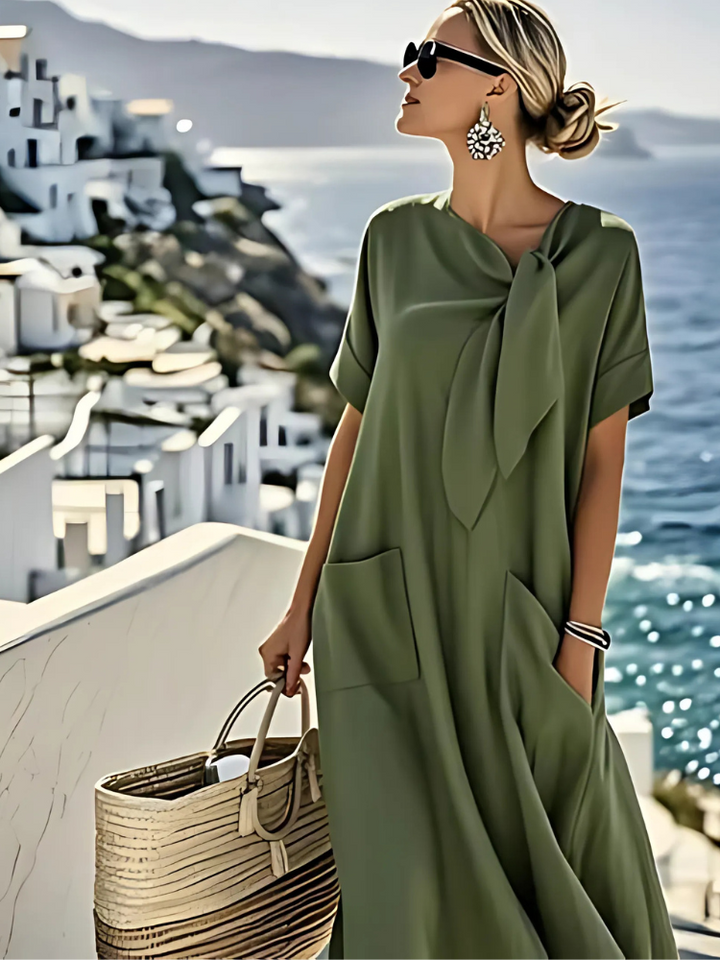 Robe d'été femme élégante et confortable avec ses poches pratiques. Idéale pour un look estival décontracté.