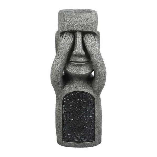 Pot de fleurs original sculpté d'un visage humain, alimenté par énergie solaire pour une touche unique au jardin.