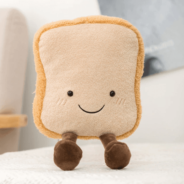 Peluche gâteau d'anniversaire coloré, jouet doux et festif, un cadeau parfait pour les enfants.