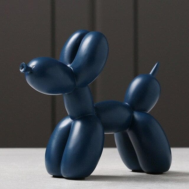 Sculpture chien ballon argentée en résine. Décoration de luxe pour une maison moderne, design et élégante.