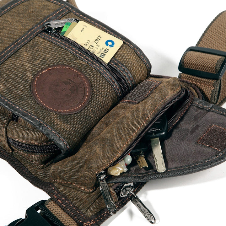 Poche de jambe noire, accessoire essentiel de rangement pour le cavalier actif.