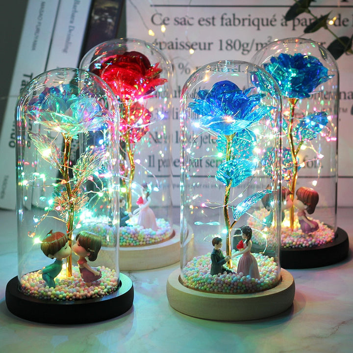 Décoration intemporelle: rose éternelle sous dôme de verre avec lumières LED.