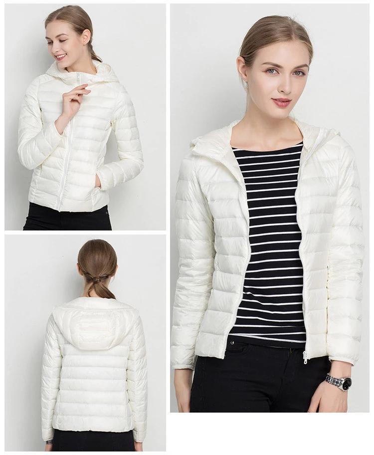 Veste doudoune femme à capuche, coupe ajustée. Légère et confortable, parfaite mi-saison.