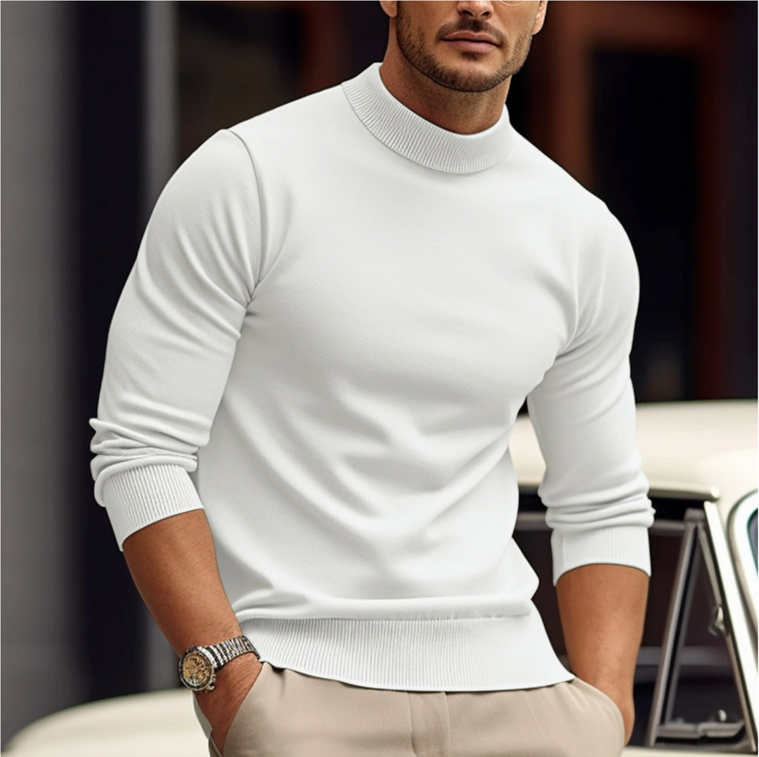Pull col roulé homme coupe slim noir. Élégant et moderne, parfait pour l'hiver ou l'automne. Confortable.