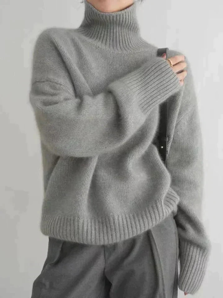 Pull col roulé femme polyvalent, parfait pour tenue décontractée ou habillée. Un classique intemporel pour automne/hiver.