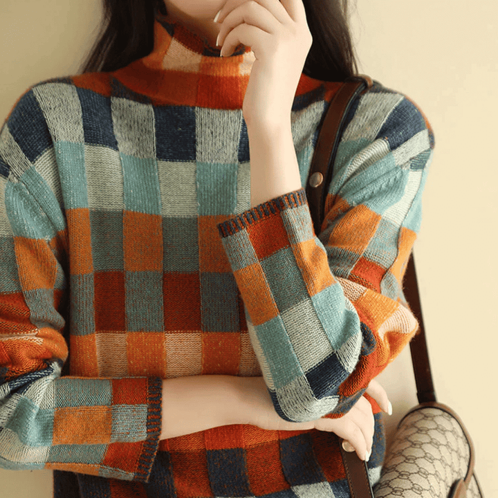 Pull d'hiver femme, col roulé orange et design patchwork unique. Parfait pour rester au chaud avec style.