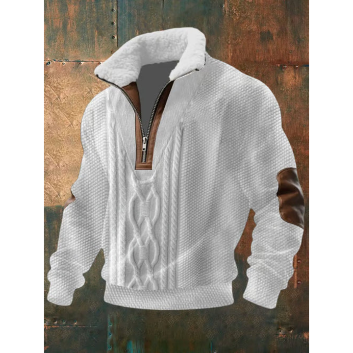 Pull homme en polaire douillette, col montant, assure chaleur et confort optimal en hiver.