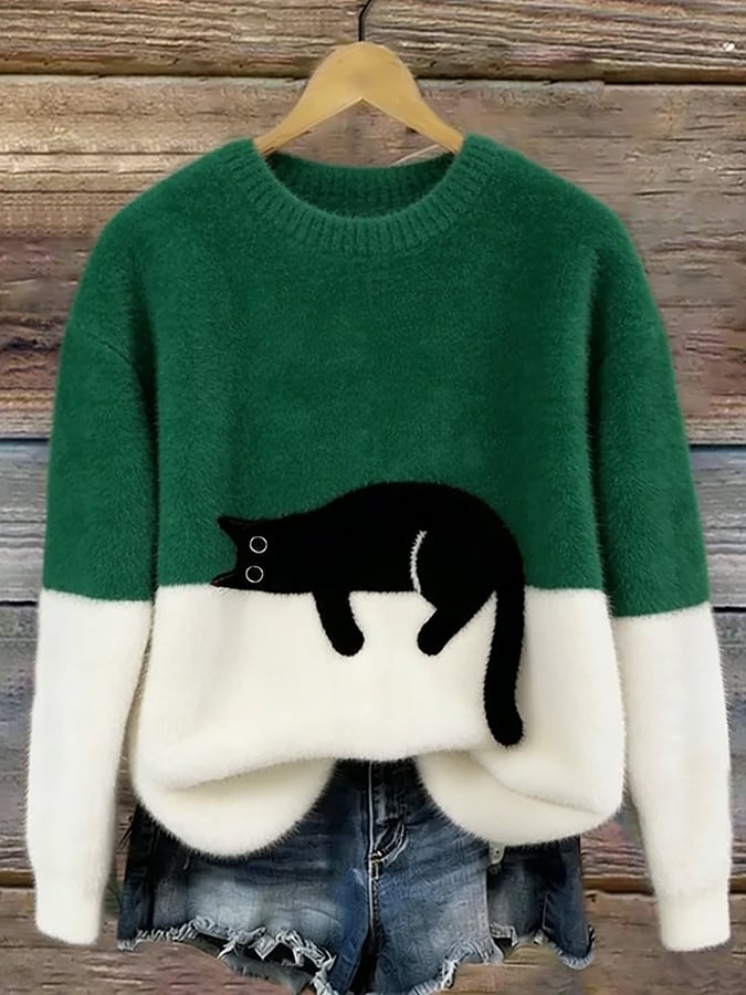 Pull femme ultra confortable, arborant un charmant motif de chat. Parfait pour un look cosy et mignon.