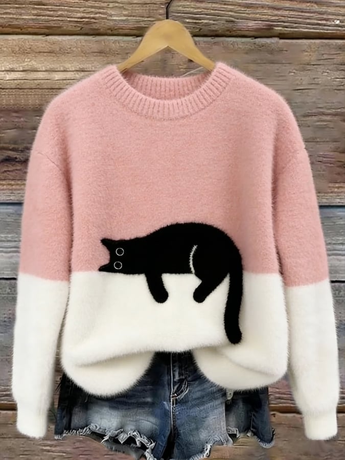 Adoptez ce pull en maille douce pour femmes, orné d'un mignon motif de chat. Parfait pour une tenue décontractée.