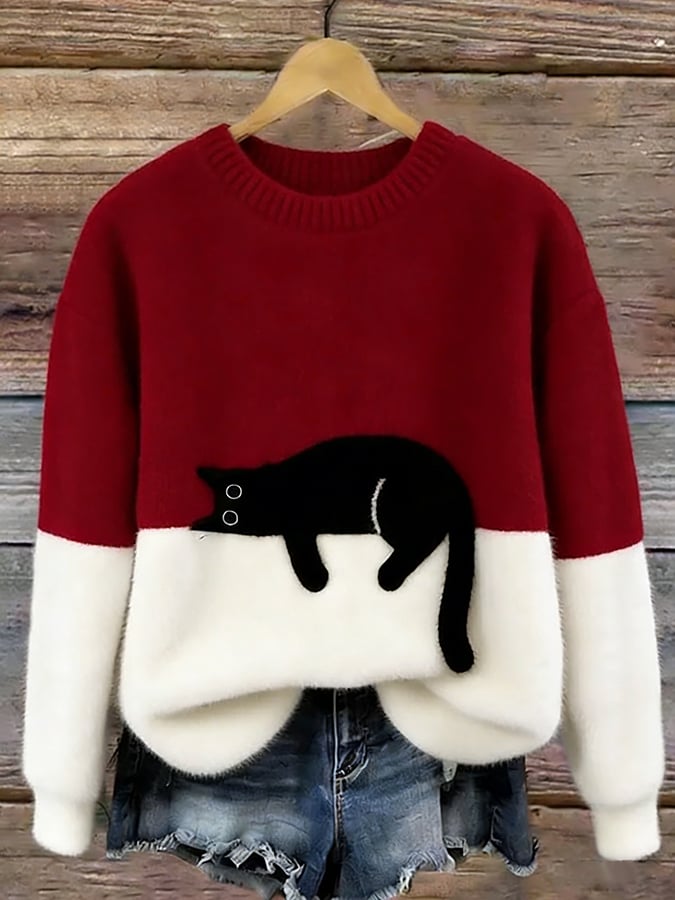 Pull femme tendance avec adorable motif chat, parfait pour une mode décontractée et amusante.