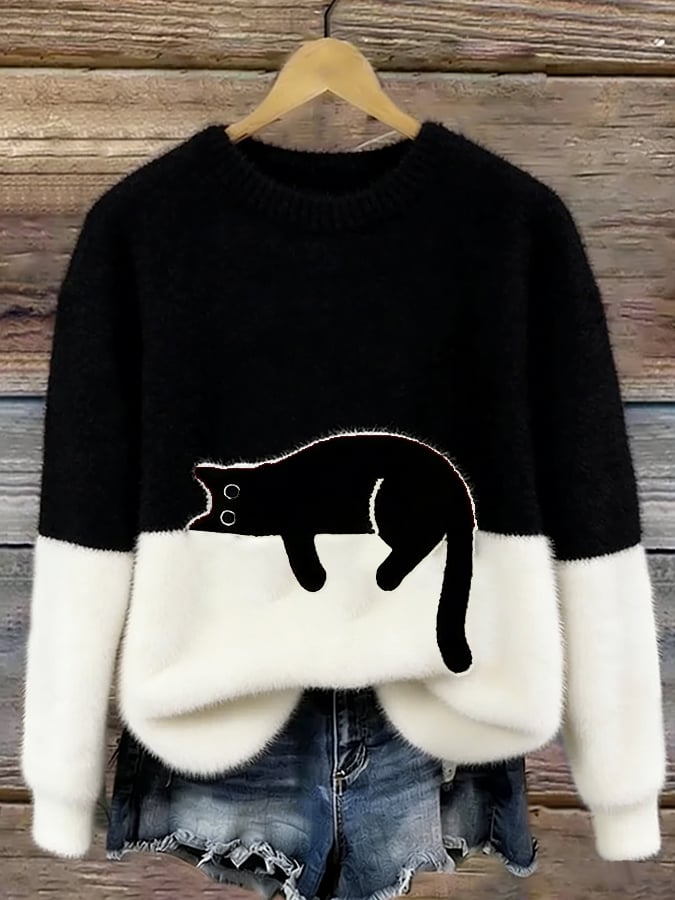 Pull en tricot confortable pour femmes avec motif chat ludique. Idéal pour un style décontracté et moderne.