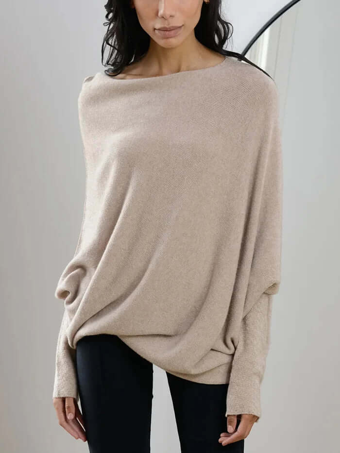 Haut femme tendance, pull asymétrique drapé, idéal pour l'automne-hiver.