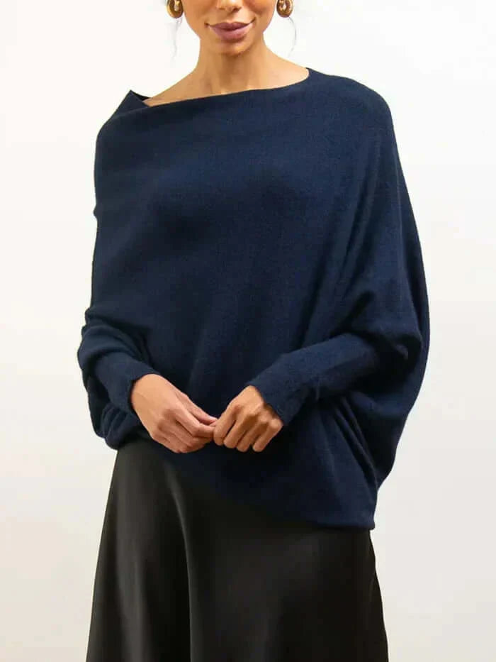 Pull femme automne-hiver, design drapé asymétrique, alliant style et confort.