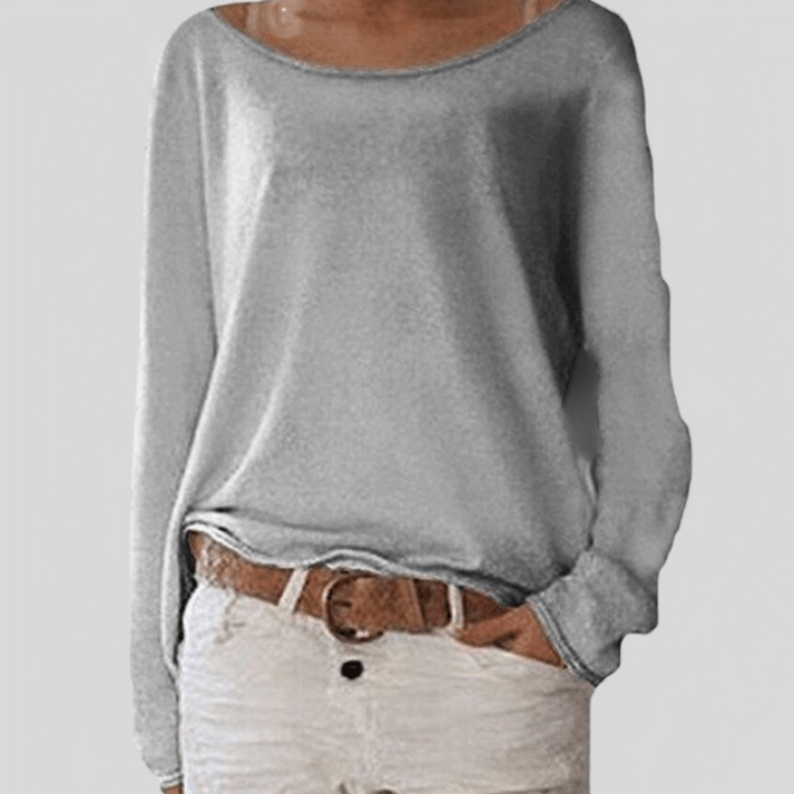 Pull basique femme col rond, très doux et polyvalent. Parfait pour une tenue tendance et confortable.