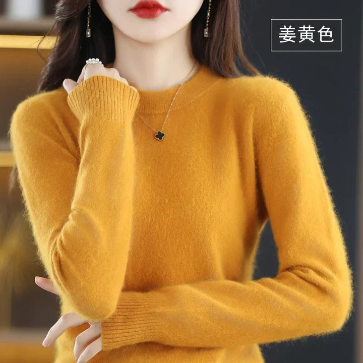 Pull élégant pour femme, coupe classique col rond, idéal pour un look chic et décontracté.