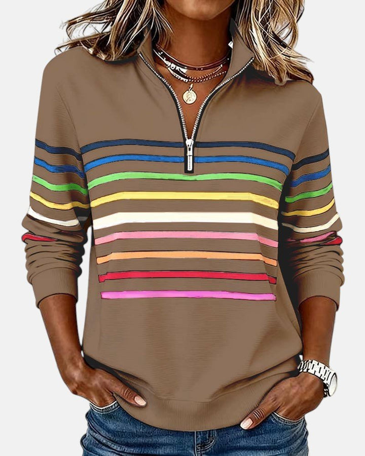 Pull femme rayé et confortable à manches longues, parfait pour un look casual.