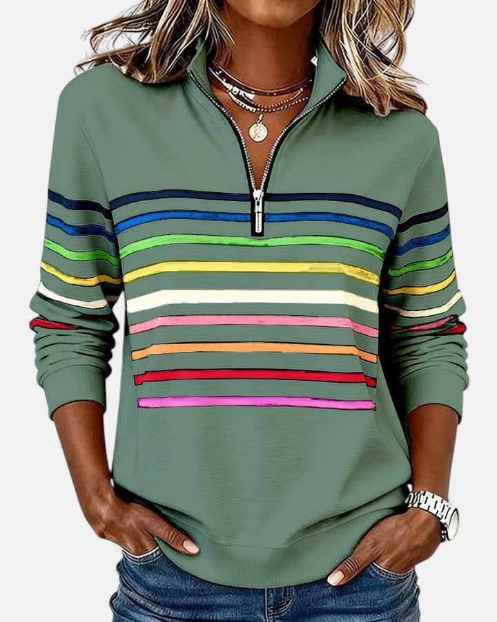 Pull femme rayé à manches longues, parfait pour un style décontracté ou semi-formel, très confortable.