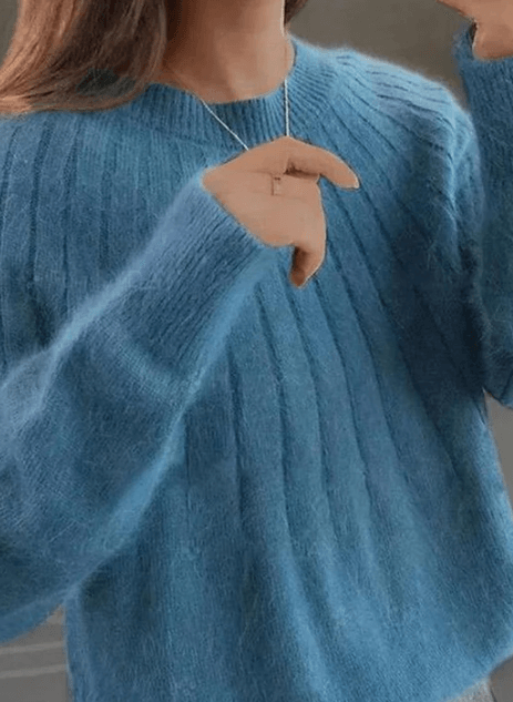 Pull doux et confortable pour femmes, idéal pour les tenues hivernales décontractées et élégantes.