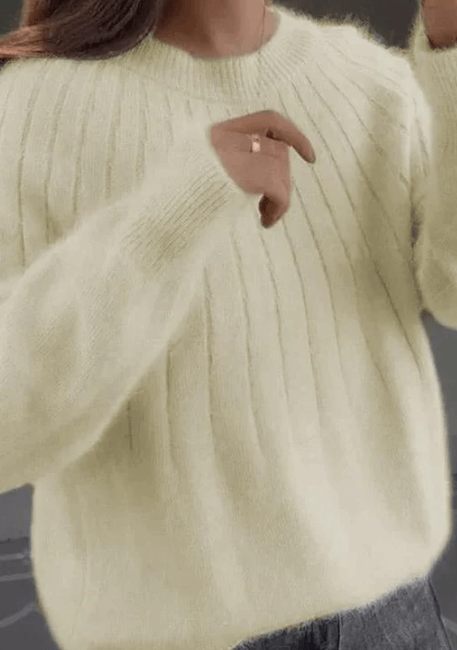 Mode femme: pull doux et chaud, parfait pour l'hiver, offrant confort et style décontracté.