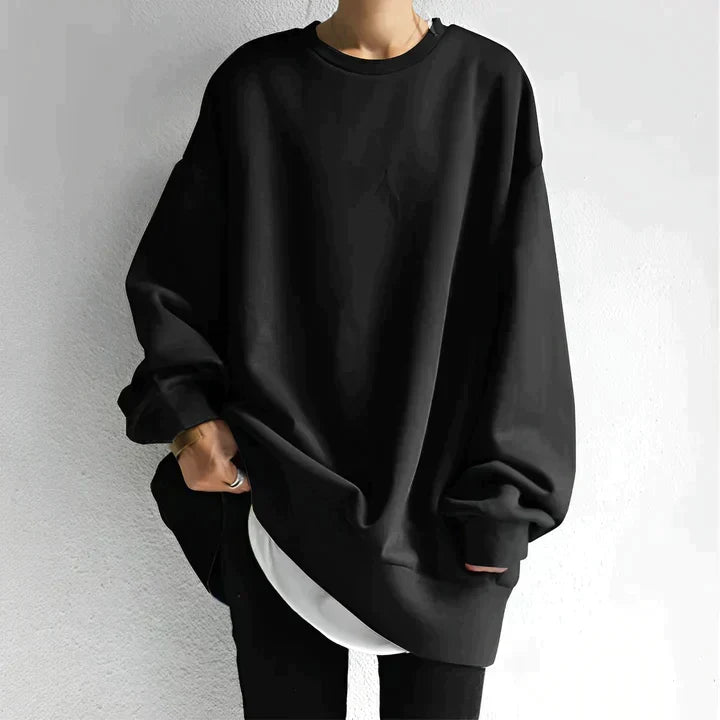 Pull tunique oversize femme élégant et confortable, manches longues et col rond. Idéal pour un style décontracté hivernal.