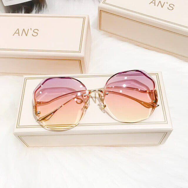Lunettes de soleil fashion dégradées, look luxe unisexe, protection UV élégante pour l'été.