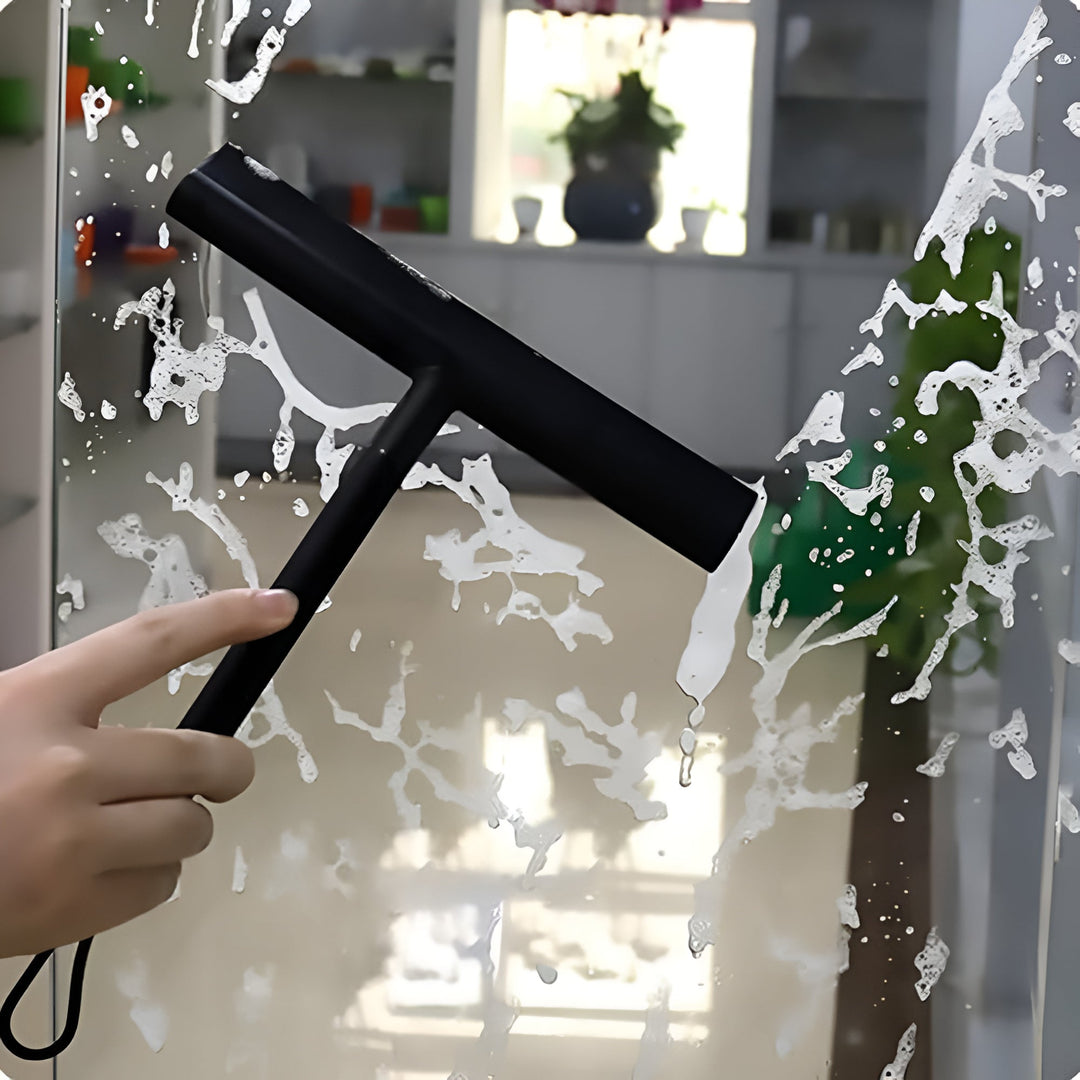 Raclette de nettoyage en silicone pour douche, garantissant un résultat impeccable et sans aucune trace sur vos vitres.