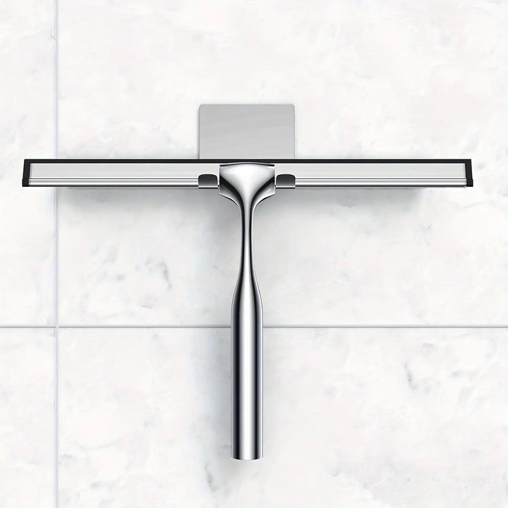 Raclette de douche moderne argentée, design pour entretien facile du verre et des surfaces miroir.