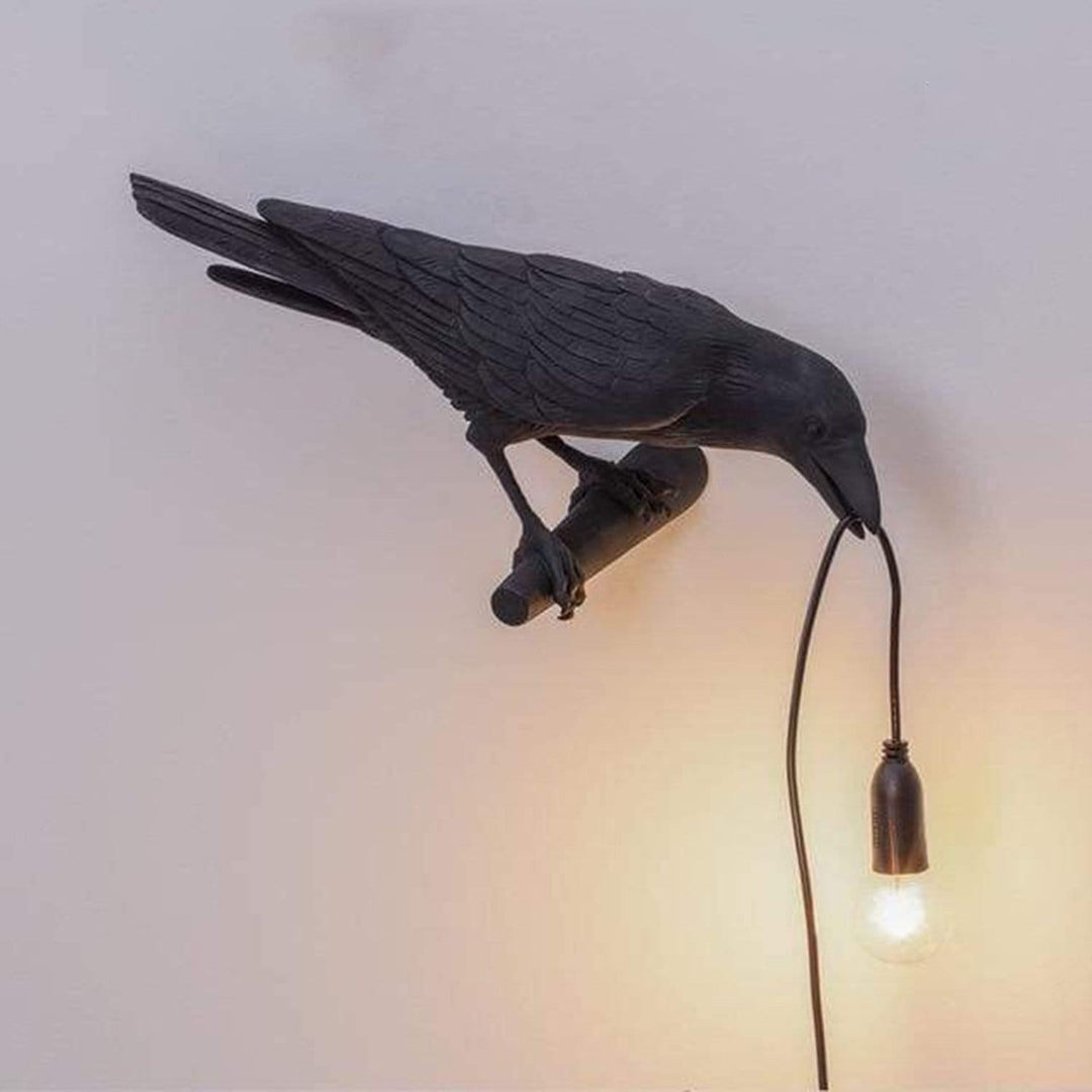 Luminaire LED RavenAura en forme de corbeau, diffuseur de lumière chaude pour une décoration cosy.