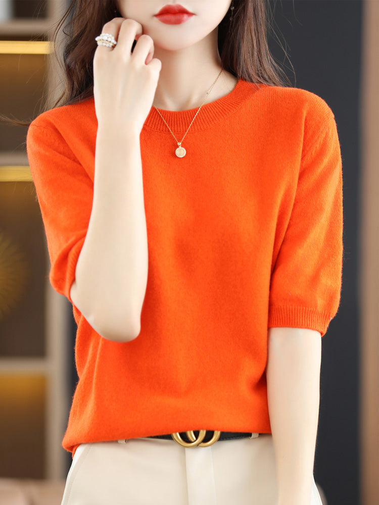 Pull femme classique, tricot chaud et polyvalent, parfait pour un style élégant en mode.